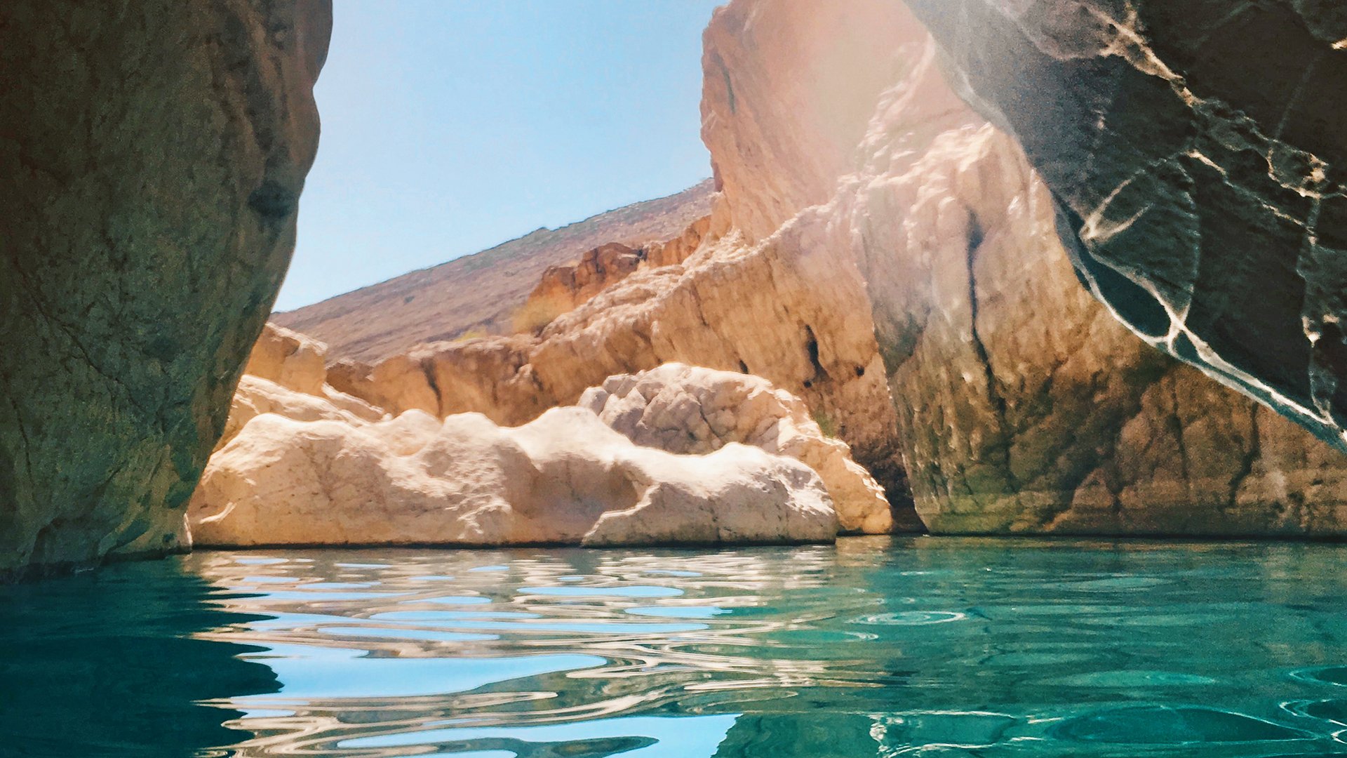 SCENIC VIEW OF ROCK FORMATION IN WATER