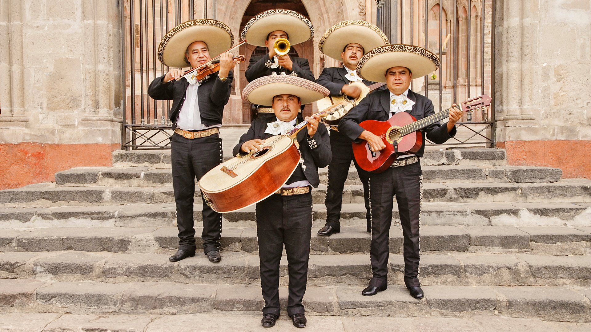 Mariachi band in front of cathedral