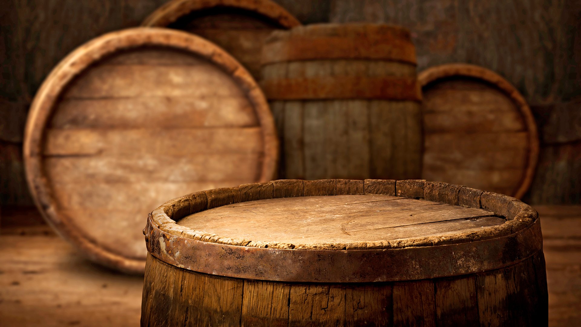 background of barrel and worn old table of wood,