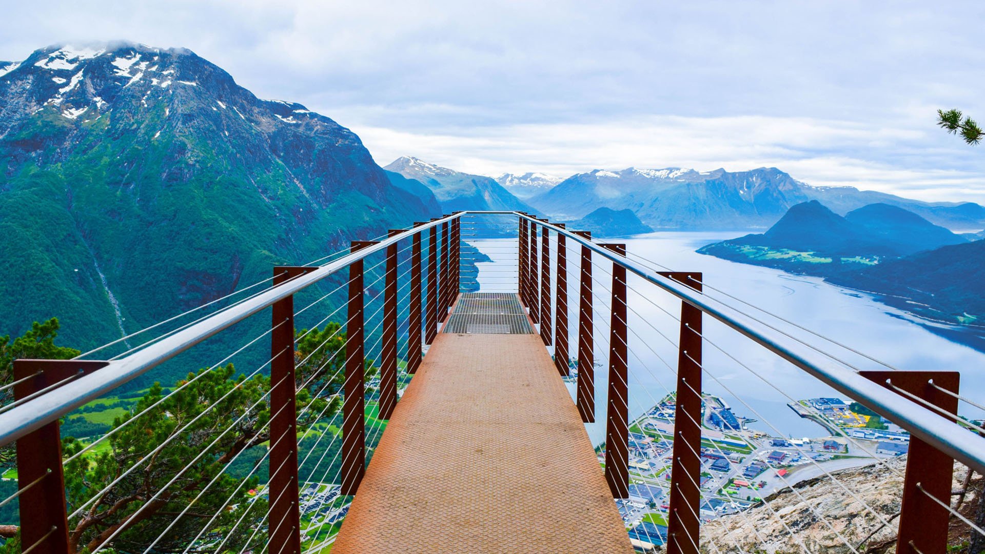 Rampestreken viewpoint. Panoramic nobody landscape to Romsdalen Valley and Andalsnes city located on shores of Romsdalsfjord (Romsdal Fjord), between picturesque mountains. Rauma Municipality, Norway.; Shutterstock ID 1855215202; purchase_order: 25906 at; job: ; client: AIDA Cruises; other: 