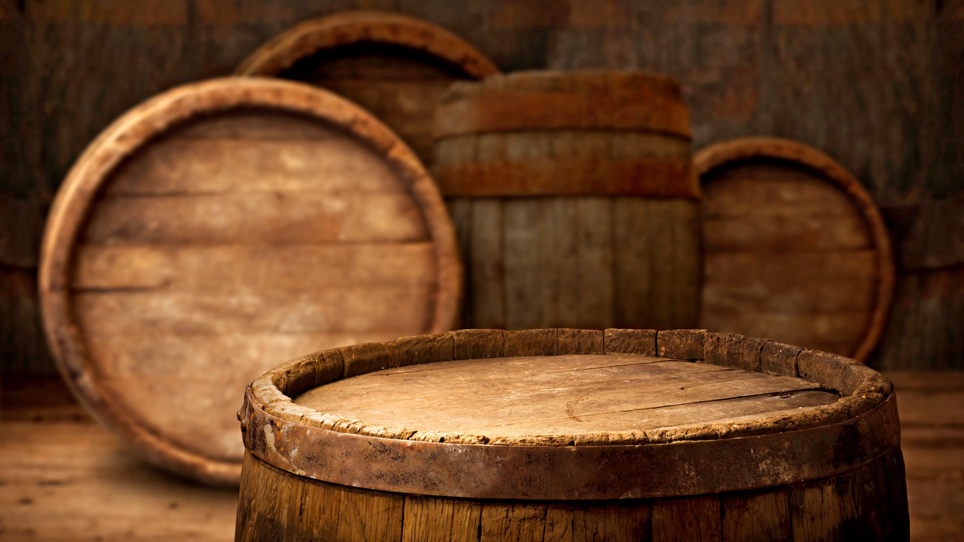 background of barrel and worn old table of wood,