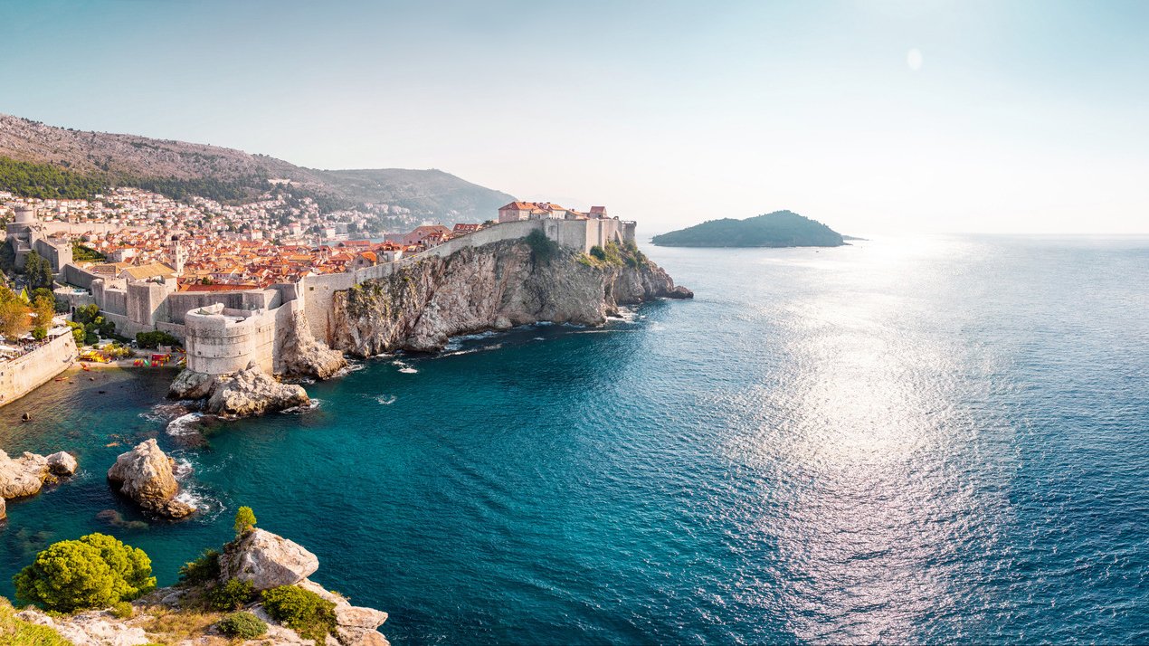 View from Fort Lovrijenac to Dubrovnik Old town in Croatia at sunset light, travel background