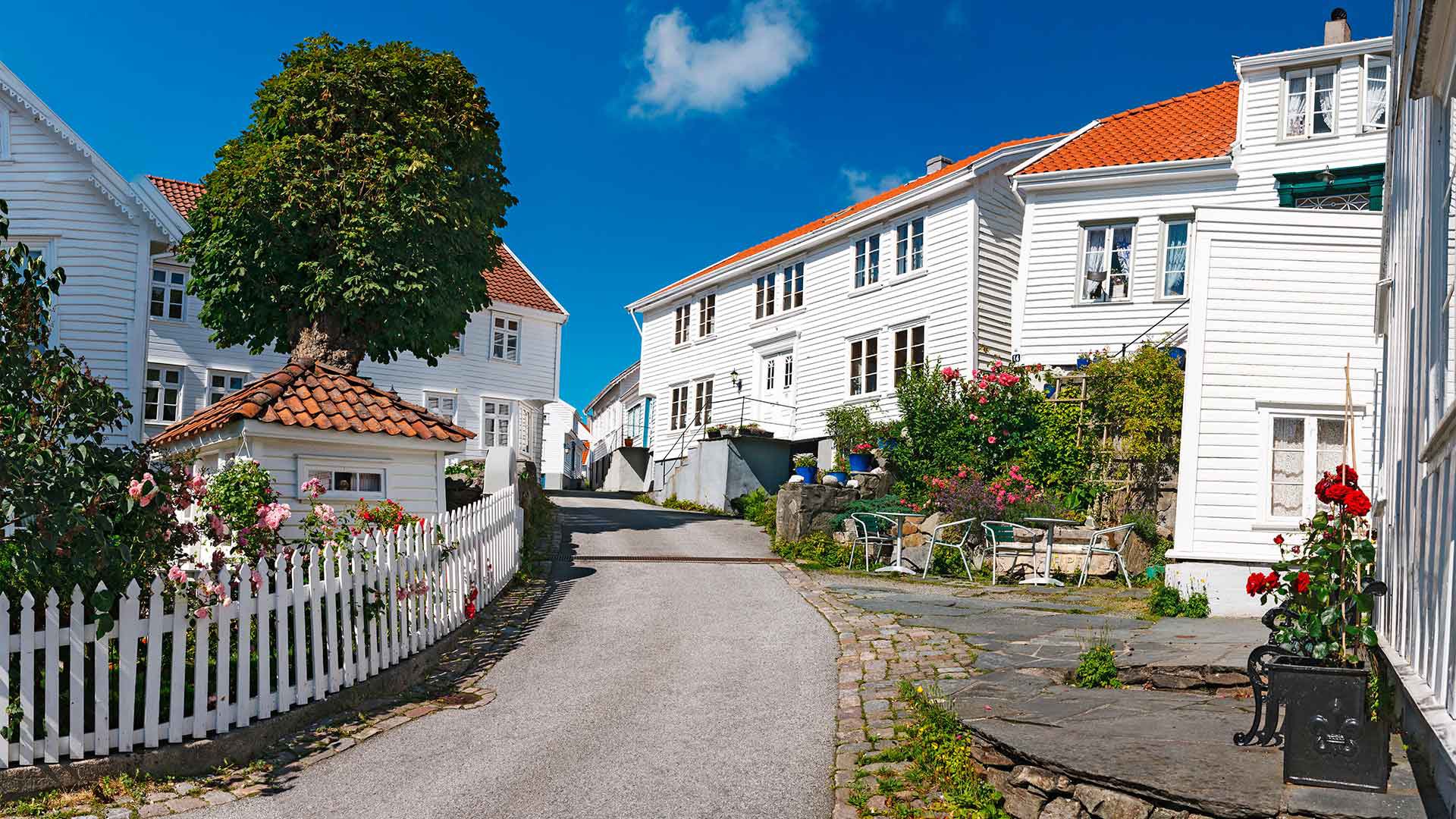 White wooden houses in old town of Skudeneshavn