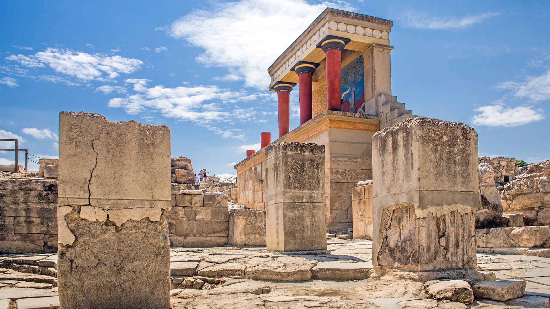 Red columns of the Knossos palace. Knossos palace on the island of Crete in Greece. Ancient ruins of the burning part of the Archaeological Museum in Heraklion.