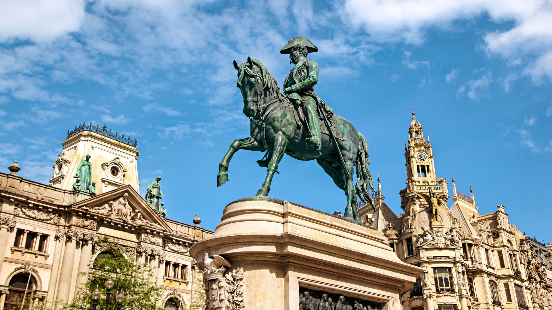 Monument of King Peter IV was built in 1866 in the middle of the Liberdade square in Porto, Portugal. The monument, by French sculptor Anatole Calmels, consists of a statue of Peter IV riding a horse and holding the Constitution that he had fought to protect during the Liberal Wars. (Porto, Portugal)