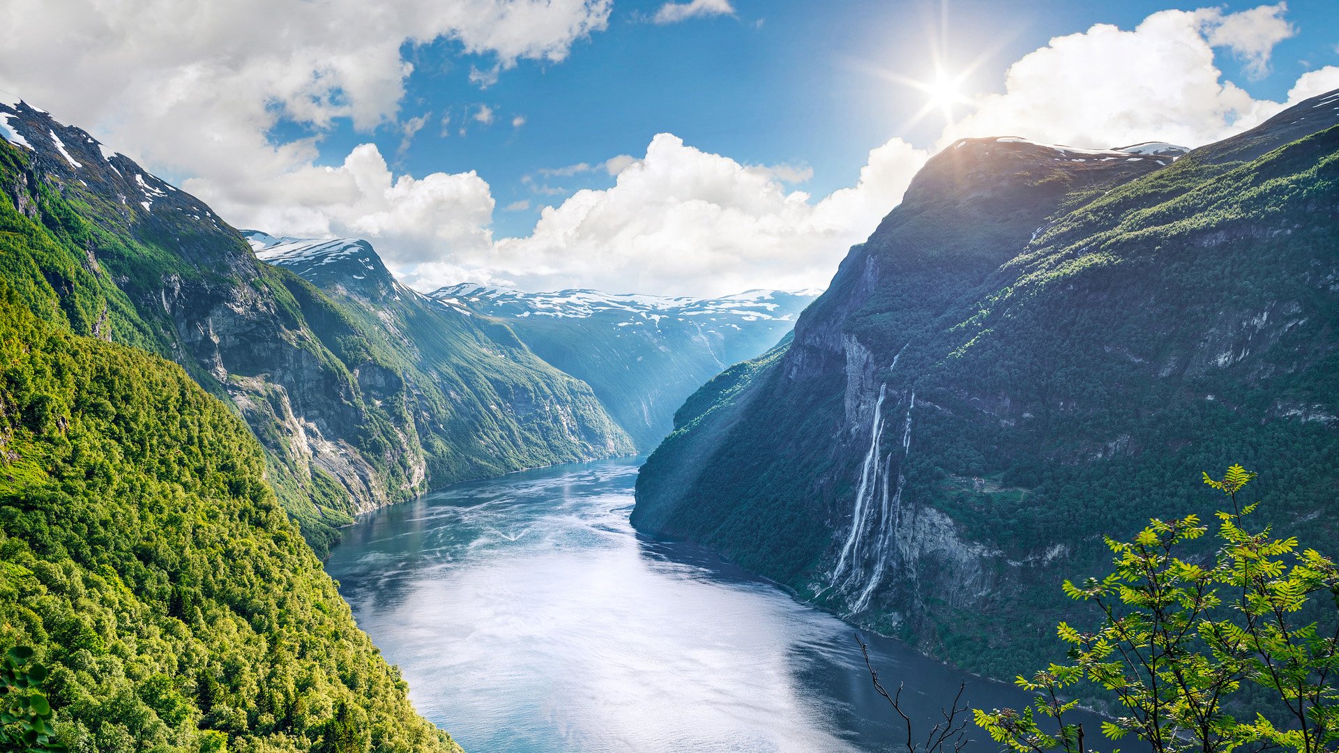 Geirangerfjord fjord. View of the old mountain farm and the Seven Sisters waterfall, Norway. Popular tourist attraction near the city of Geiranger