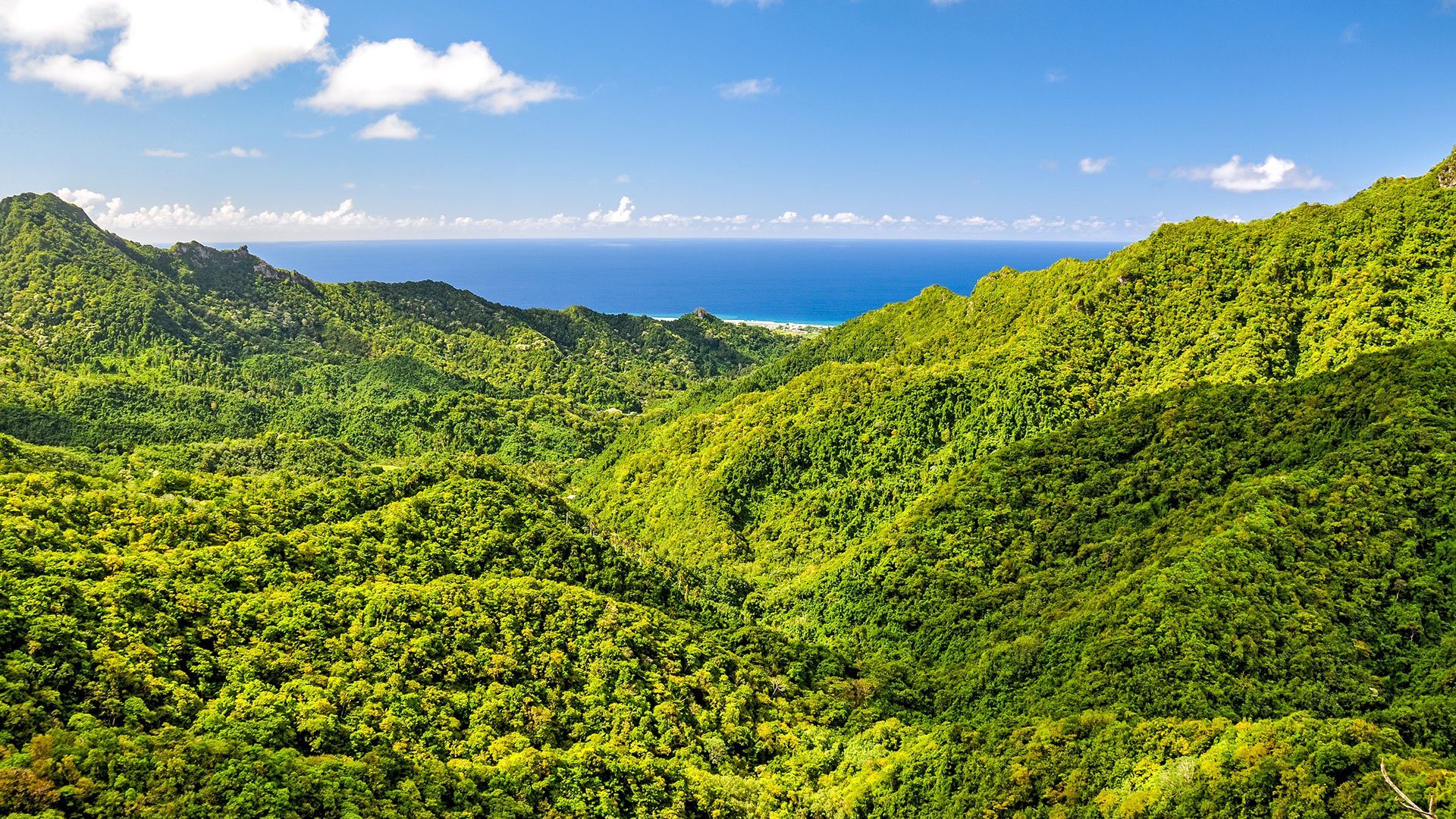 Stunning panorama view from a place called "The Needle" on Rarotonga, the main island of the Cook Islands in the South Pacific. The viewpoint can be reached through hiking the "Cross Island Walk".