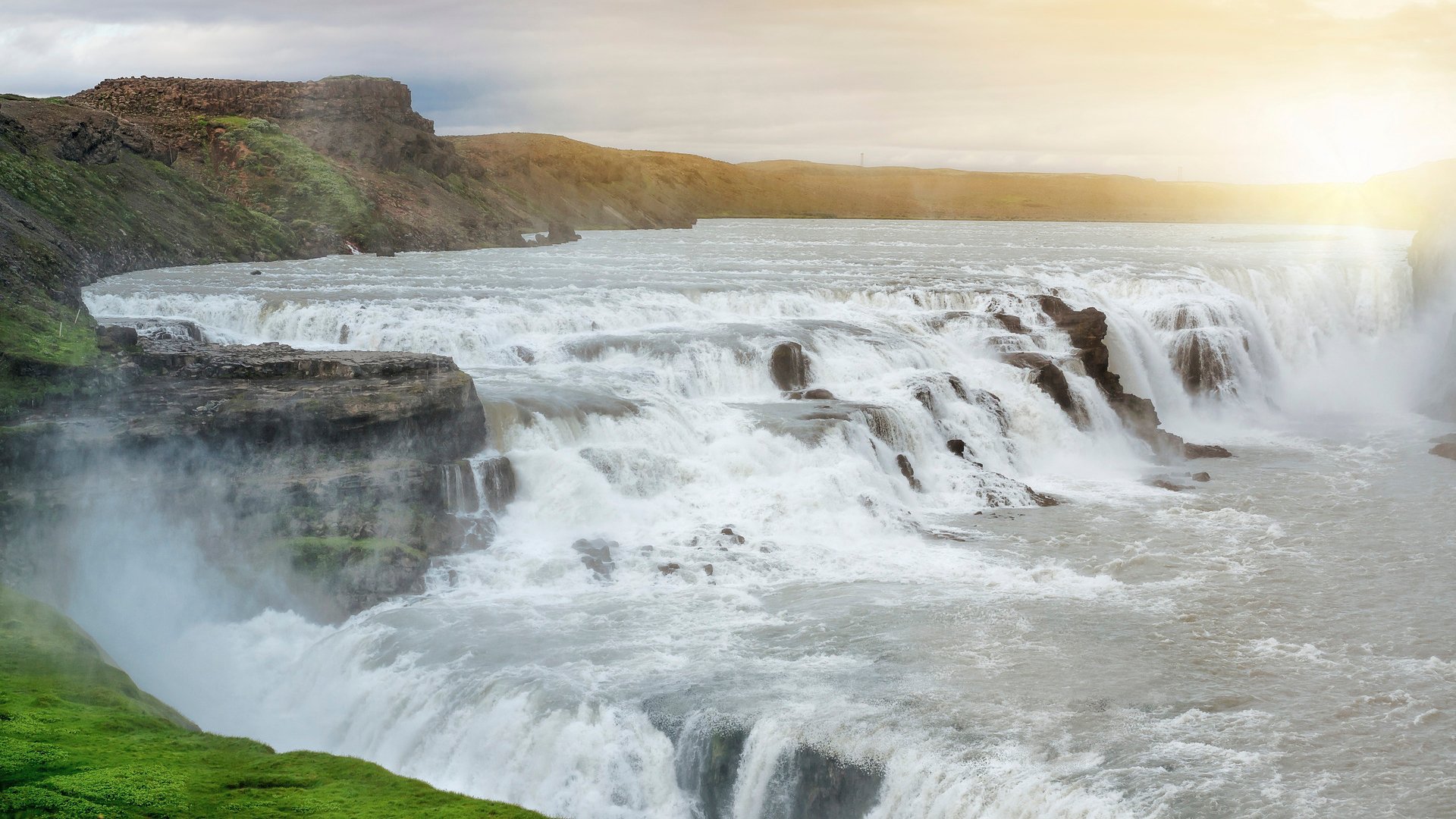 Beautiful and powerful Gullfoss waterfalls in Iceland by sunset; Shutterstock ID 216684799