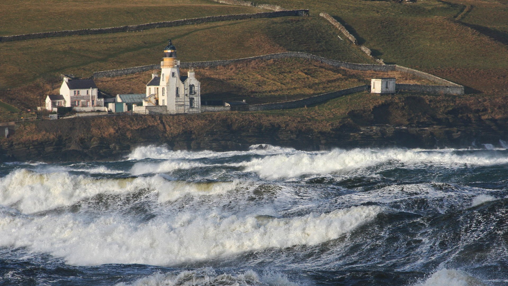 Stormy Atlantic Pentland Firth area with huge waves near Scrabster Lighthouse near Thurso in Caithness, Scotland