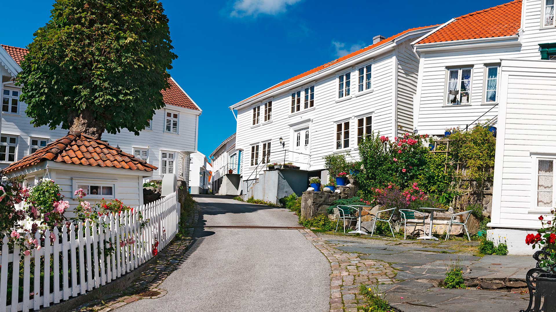 White wooden houses in old town of Skudeneshavn