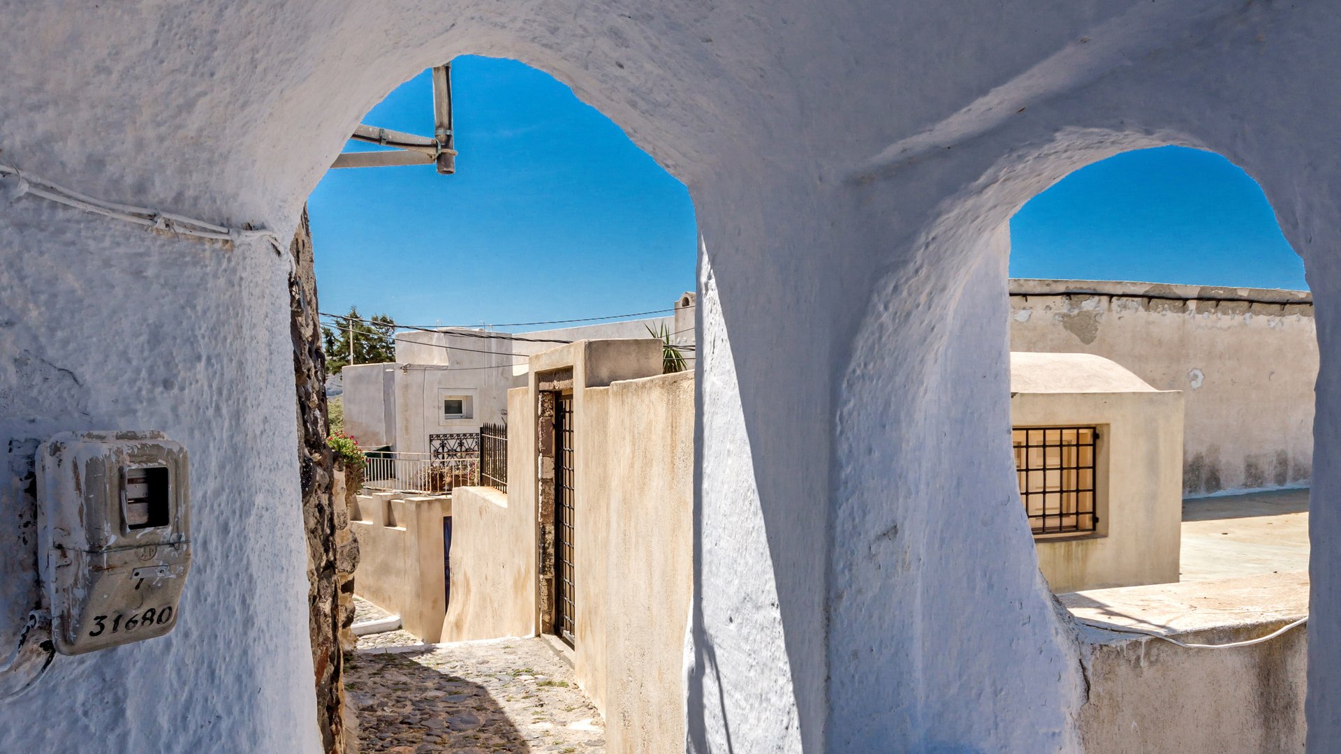 Street in the castle of Pyrgos Kallistis, Santorini island, Thira, Cyclades, Greece