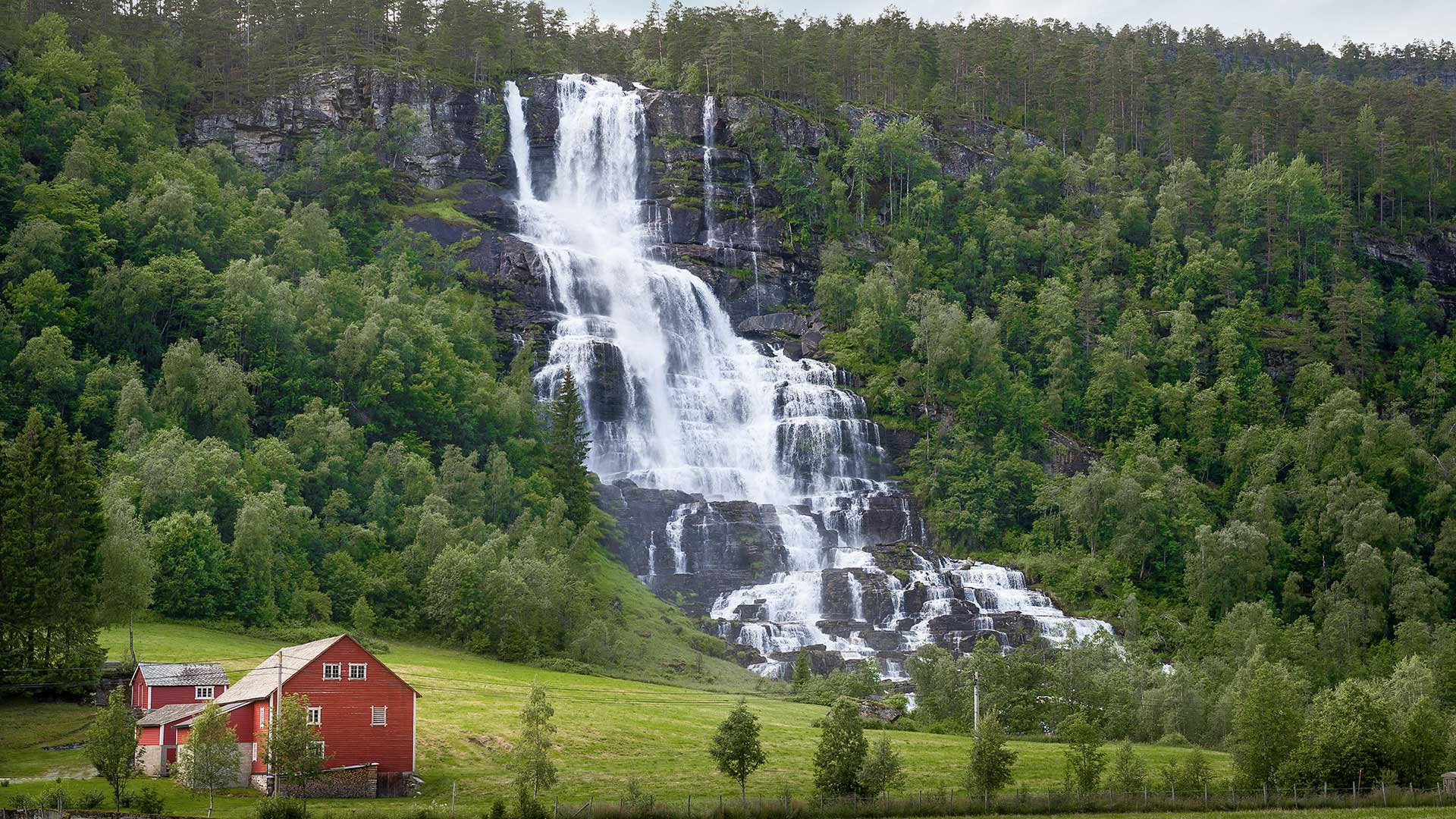 Tvindefossen waterfall in Norway village