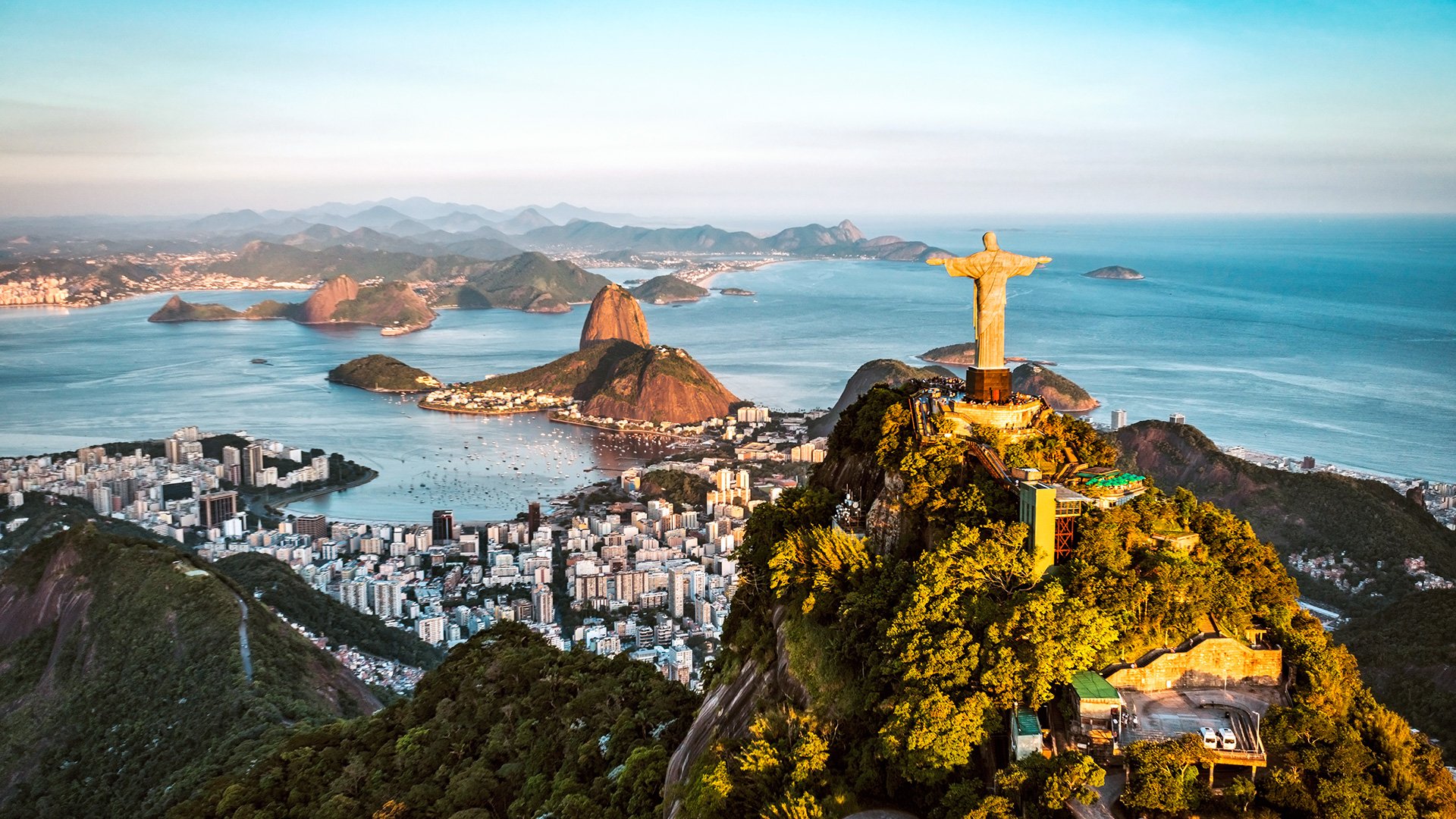 Aerial view of Christ and Botafogo Bay from high angle.