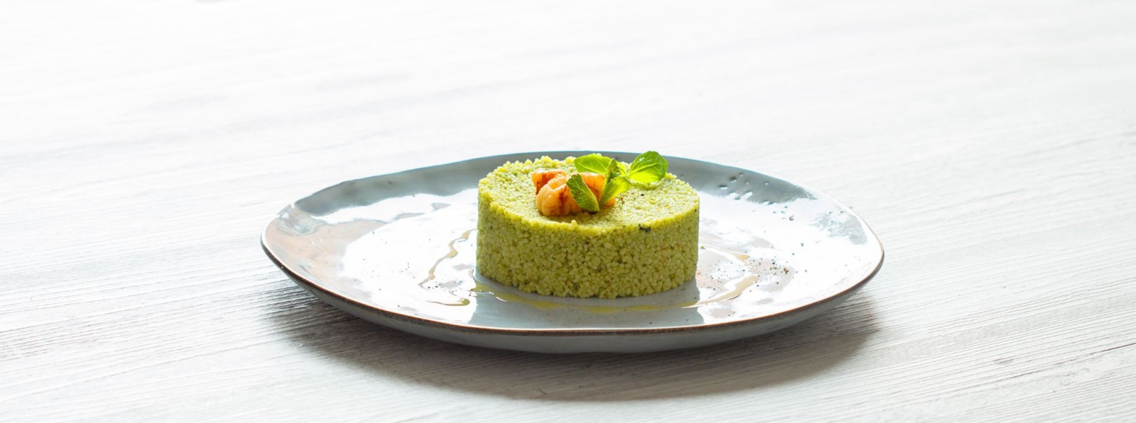 Cous cous alle erbe aromatiche con code di gambero