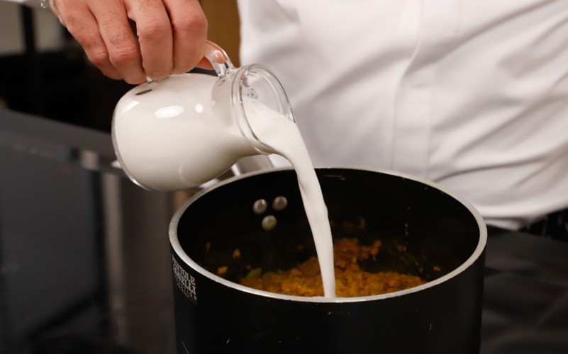 aggiungere latte di cocco