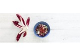 Insalatona di radicchio con citronette al peperoncino e melogranoalt
