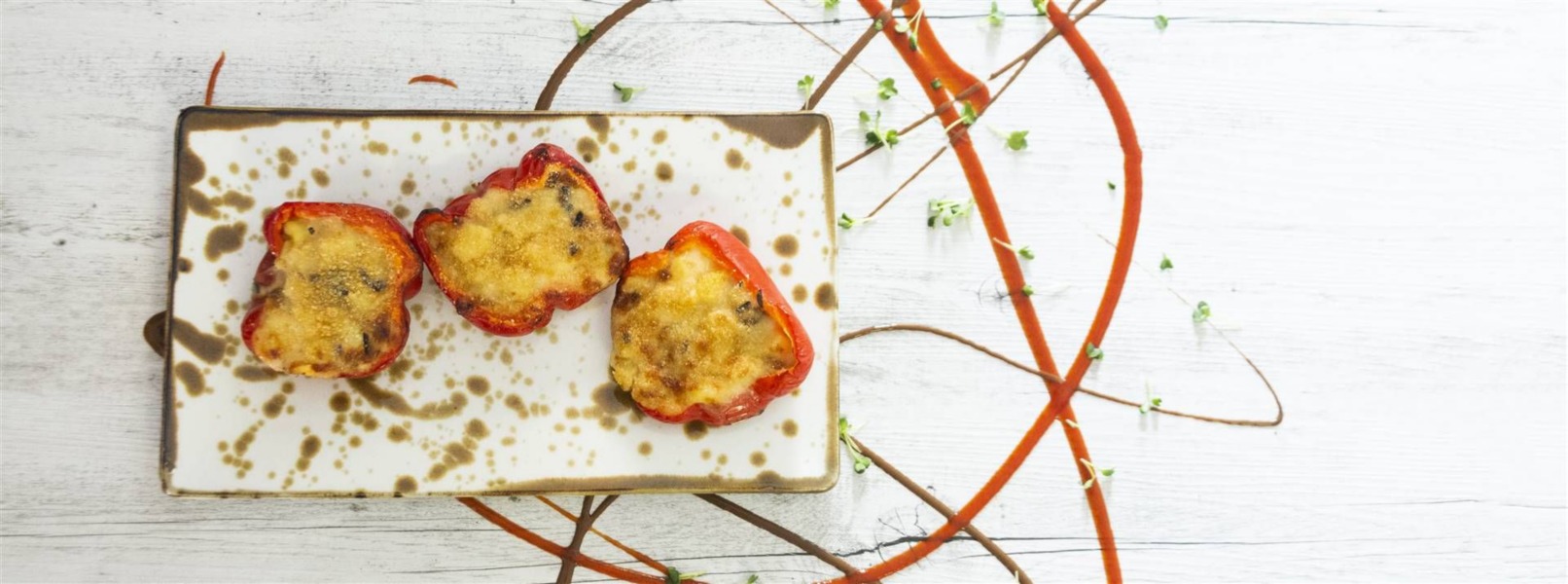 Peperoni imbottiti con patate e melanzane