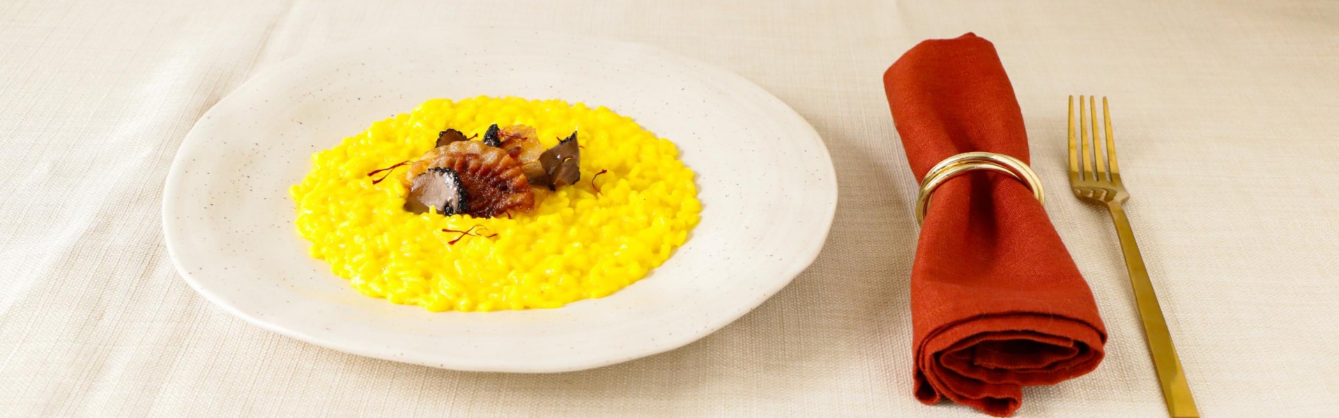 risotto-allo-zafferano-guanciale-e-olio-al-tartufo 