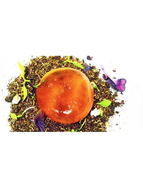 Tuorlo marinato con terra di nocciole rosmarino e fava di cacao