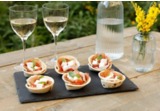 Tartellette salate ripiene con mozzarella, culatta e pomodorinialt