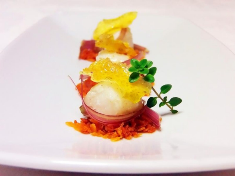 Baccalà su sabbia di pane carasau