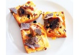 Crostini di pan tramvai con foie gras e tartufoalt