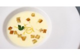Fonduta di taleggio Dop con limoni canditi e pane croccantealt