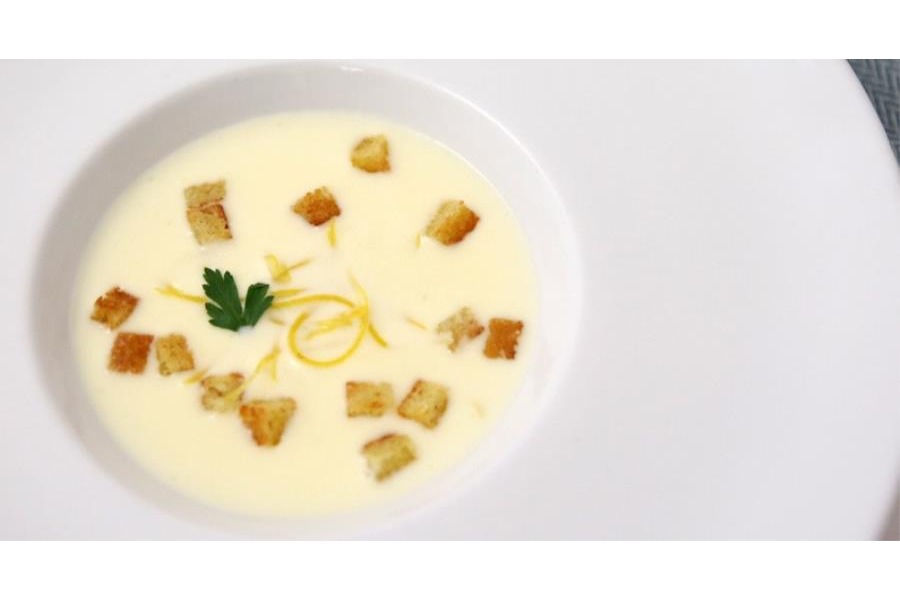 Fonduta di taleggio Dop con limoni canditi e pane croccante