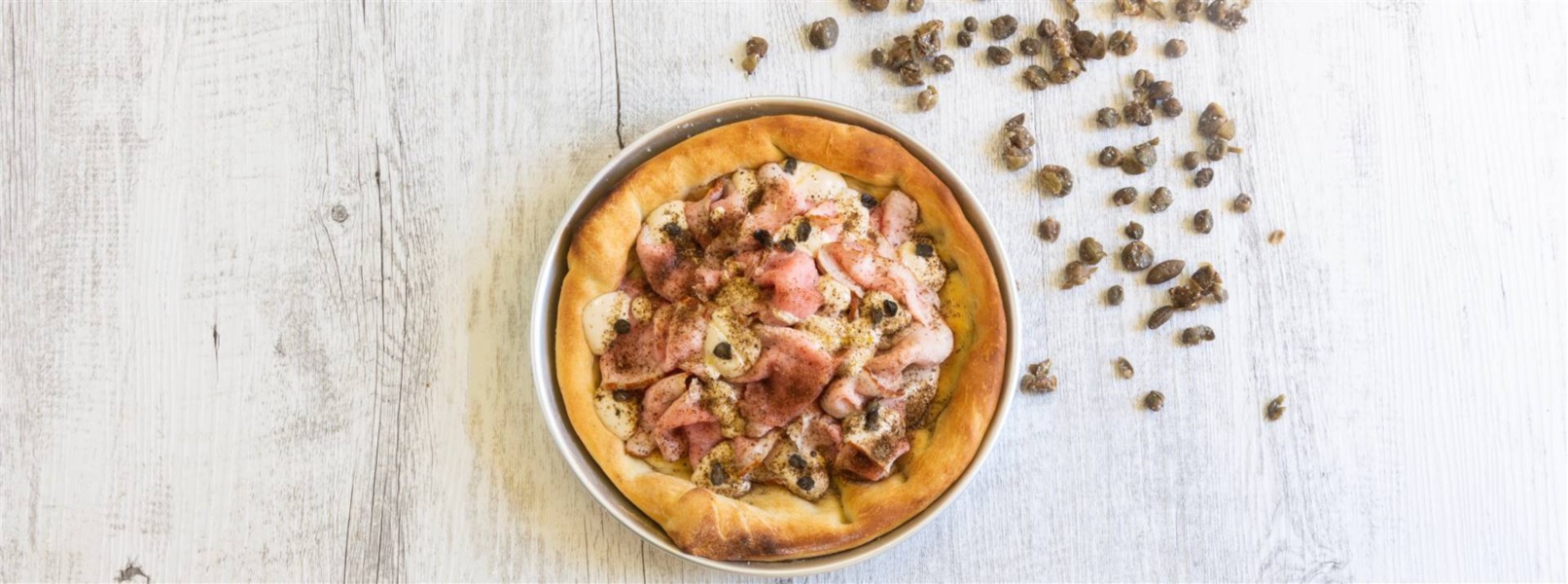 Pizza con tiramisu di vitello