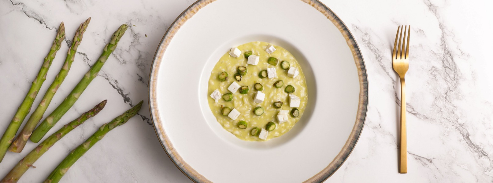 Risotto con asparagi e caprino