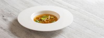 Brodo di prosciutto e scalogno con porro alla piastraalt