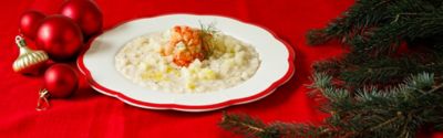 Risotto allo squacquerone con code di gambero e pere marinatealt