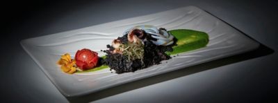 Cous cous con nero di seppia e crema di pisellialt