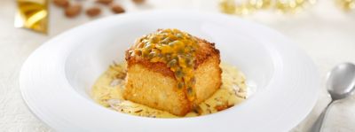  Cubotto di pandoro con zabaione, passion fruit e mandorlealt