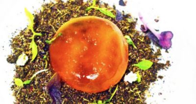 Tuorlo marinato con terra di nocciole rosmarino e fava di cacaoalt