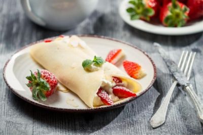 Crêpes con crema pasticcera e fragolealt