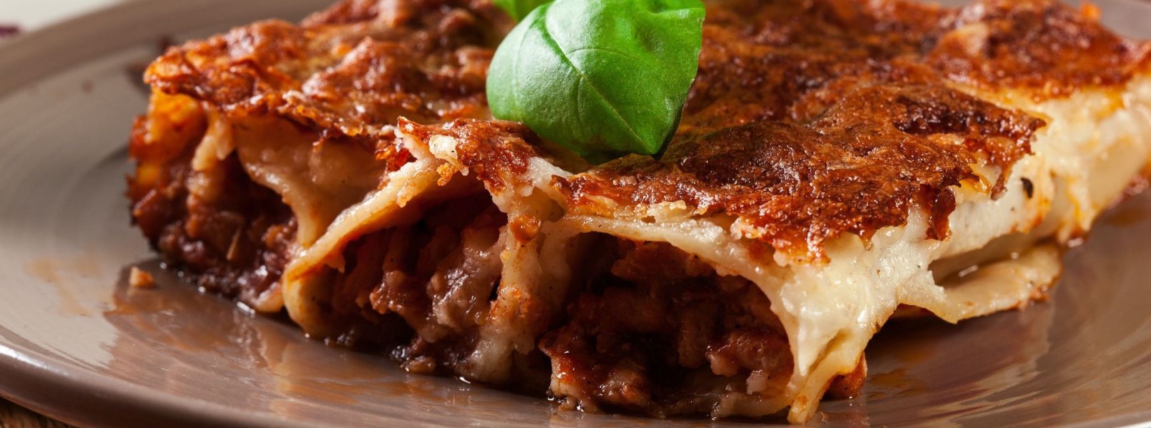 Cannelloni al forno con prosciutto di Parma Dop e salsiccia