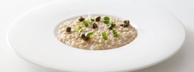 Fregola risottata con ricotta, alici, capperi e olio di Sardegna: una ricetta tra tradizione e innovazione alt