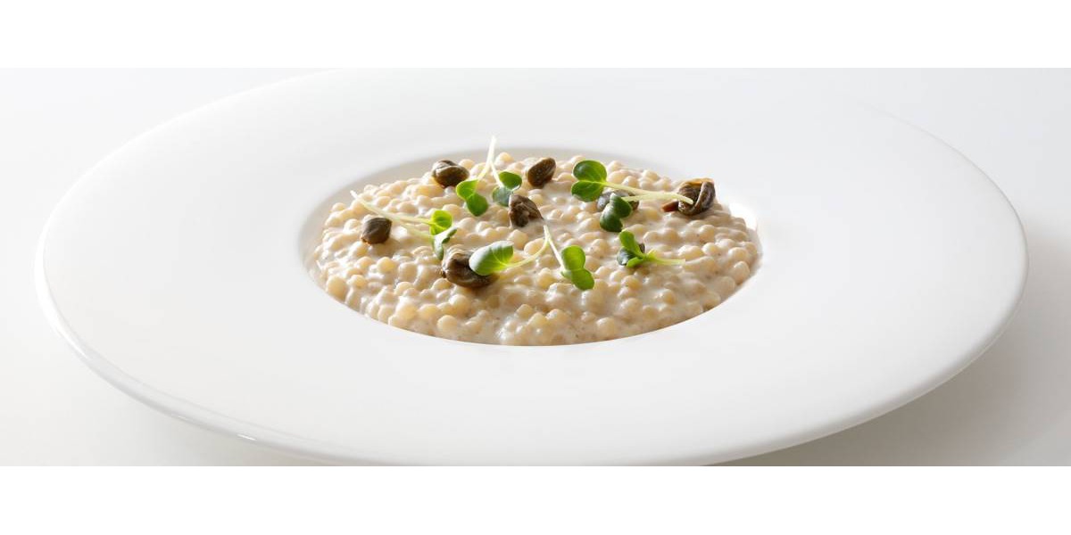 Ricetta fregola risottata con ricotta, alici, capperi e olio della Sardegna 