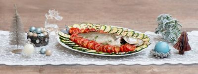 Branzino al forno con zucchine e pomodorini alla griglia, la ricetta di Natalealt