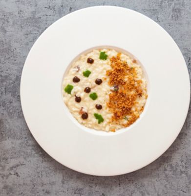 Risotto, guanciale in due consistenze, salsa agli spinaci e cipolla caramellataalt