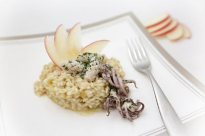 Risotto con Pink Lady e calamari mantecato all'aceto balsamicoalt