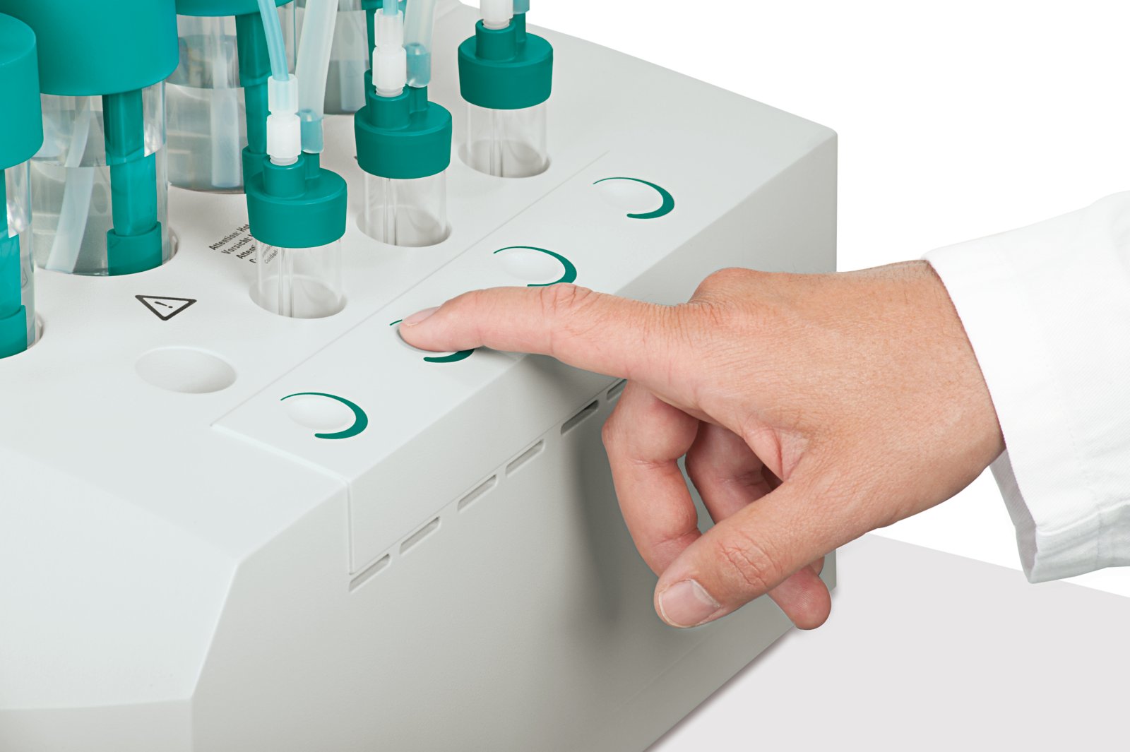 Finger pressing the start button of an individual measuring position directly on an oxidation stability apparatus 892 Professional Rancimat or 895 Professional PVC Thermomat.