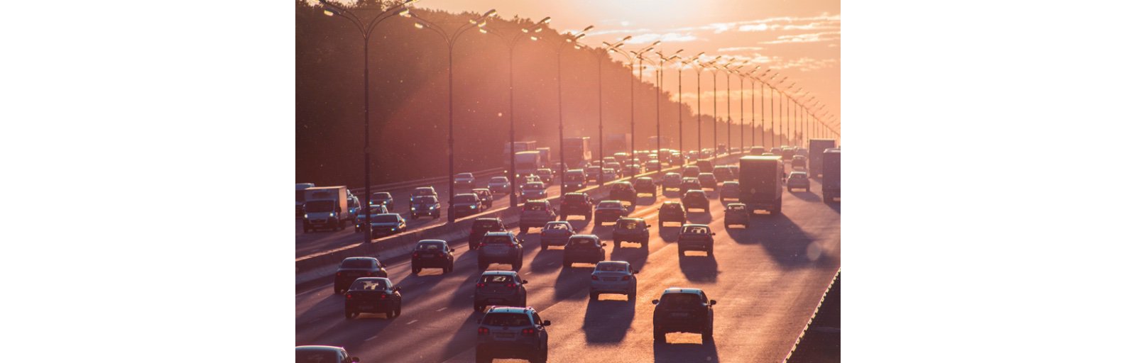 Vehicles traveling on a busy highway.