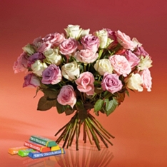 Abundance of Pastel Roses with Tony's Chocolonely Tasting Pack                                                                  